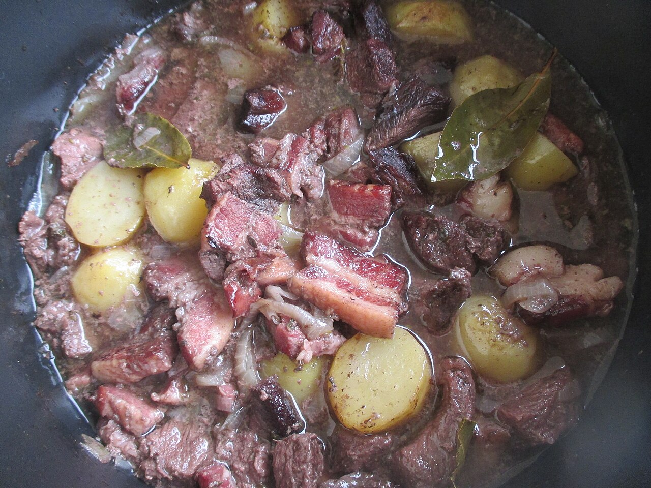 A plate of daube provençale, beef stewed slowly in red wine