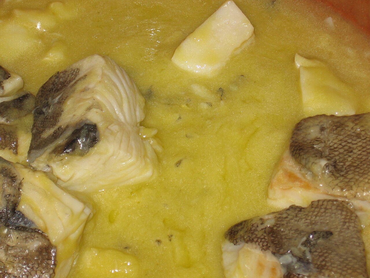 A dish of salt cod in pil pil sauce, the Basque oil and garlic emulsion