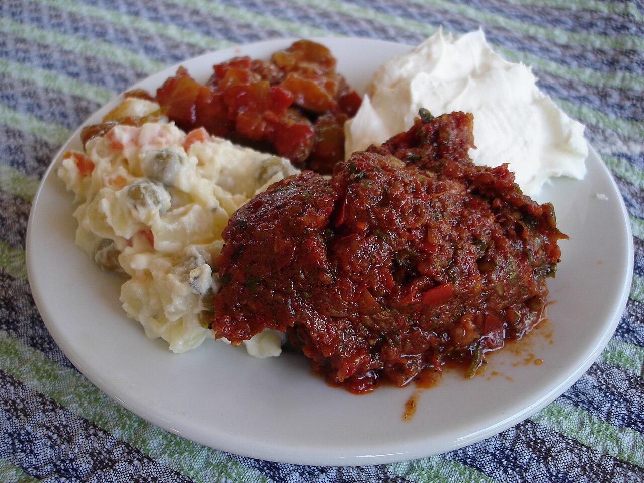 A plate of Turkish meze with several small cold dishes
