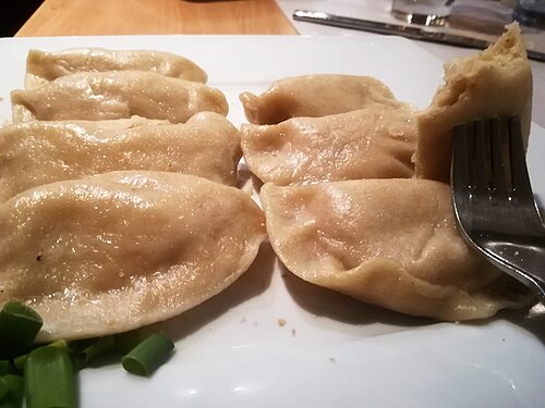 A plate of pierogi ruskie, dumplings filled with potato and curd cheese, in Gdańsk