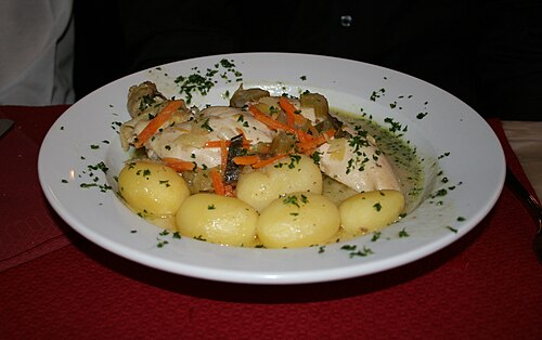 A bowl of waterzooi, the creamy Flemish stew with vegetables