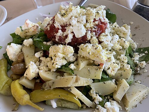 A Cretan salad served on a plate at a taverna in Crete