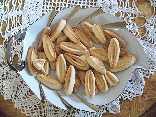 A dish of navettes, the boat-shaped orange blossom biscuits of Marseille