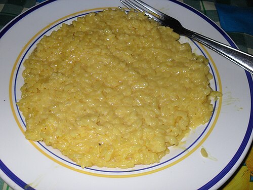 A plate of saffron risotto alla milanese