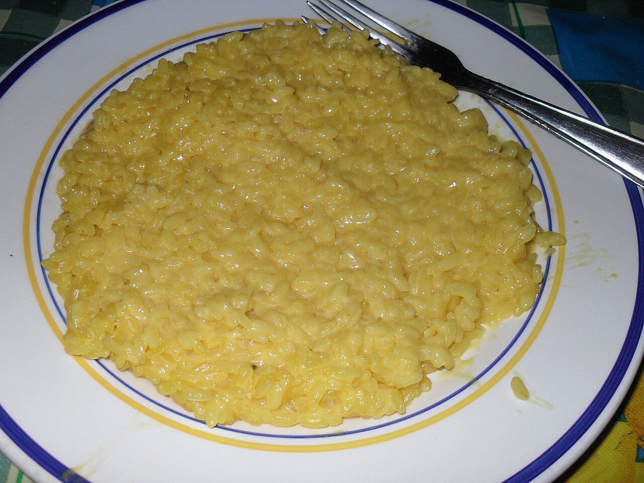 A plate of saffron risotto alla milanese