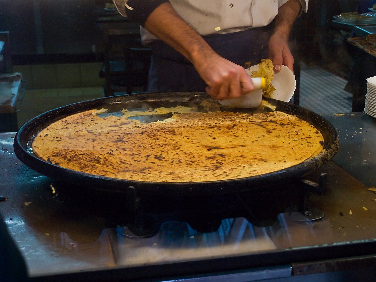 A tray of socca, the chickpea pancake of Nice