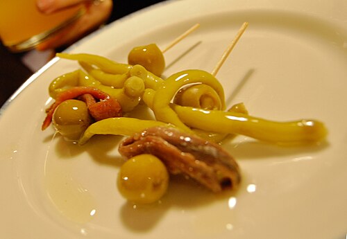 Gildas, olive, anchovy and pickled pepper skewers, on a bar counter in Donostia